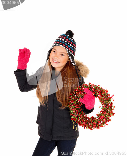 Image of Girl with advents wreath.