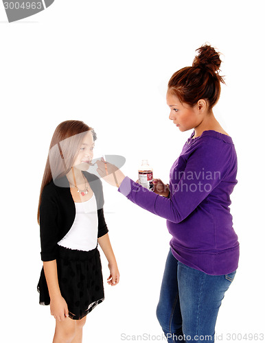 Image of Girl get medicine.