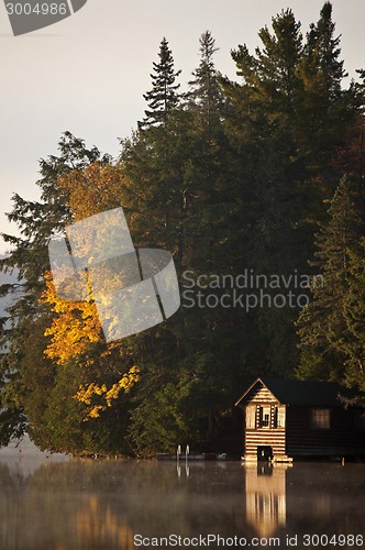 Image of Lake in Autumn sunrise reflection