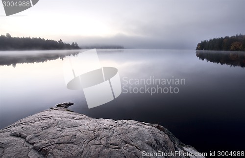 Image of Lake in Autumn sunrise reflection