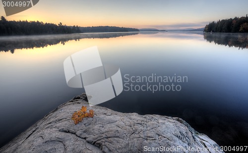 Image of Lake in Autumn sunrise reflection