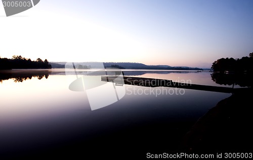 Image of Lake in Autumn sunrise reflection