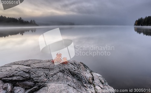 Image of Lake in Autumn sunrise reflection