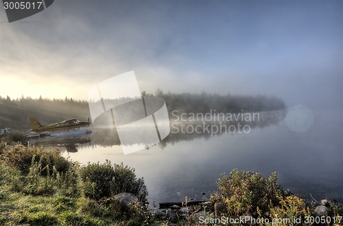 Image of Lake in Autumn sunrise reflection