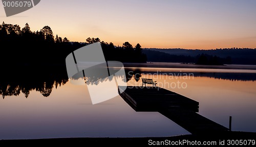 Image of Lake in Autumn sunrise reflection
