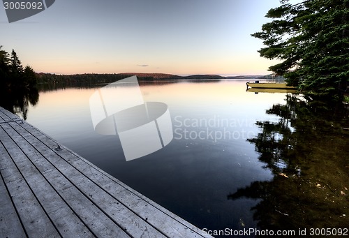 Image of Lake in Autumn sunrise reflection