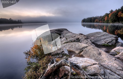 Image of Lake in Autumn sunrise reflection