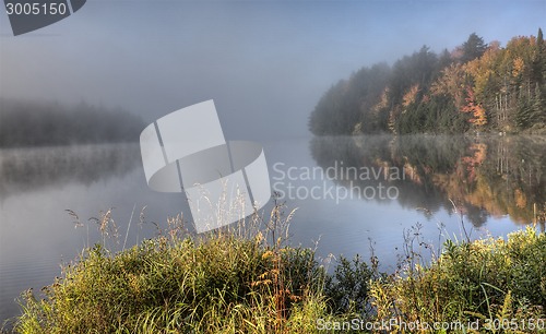 Image of Lake in Autumn sunrise reflection