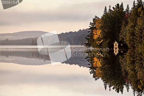 Image of Lake in Autumn sunrise reflection