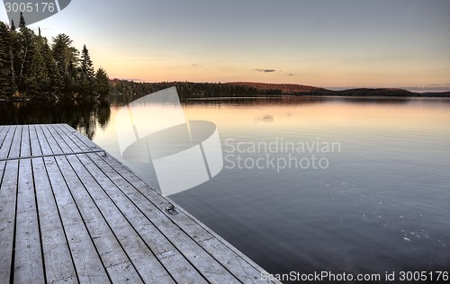 Image of Lake in Autumn sunrise reflection