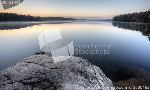 Image of Lake in Autumn sunrise reflection