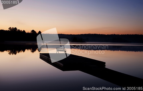 Image of Lake in Autumn sunrise reflection