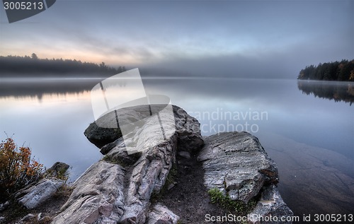 Image of Lake in Autumn sunrise reflection