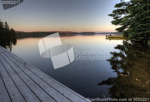 Image of Lake in Autumn sunrise reflection