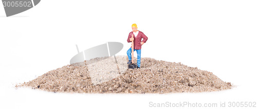 Image of Miniature worker with a shovel