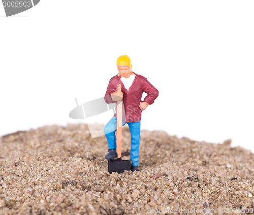 Image of Miniature worker with a shovel