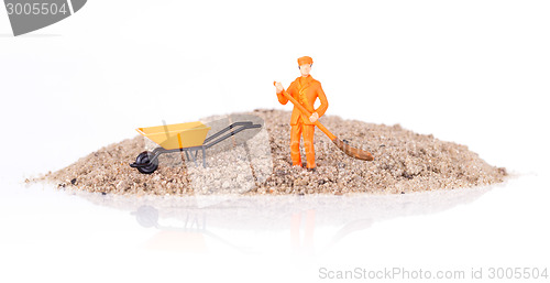 Image of Miniature worker is cleaning a keyboard