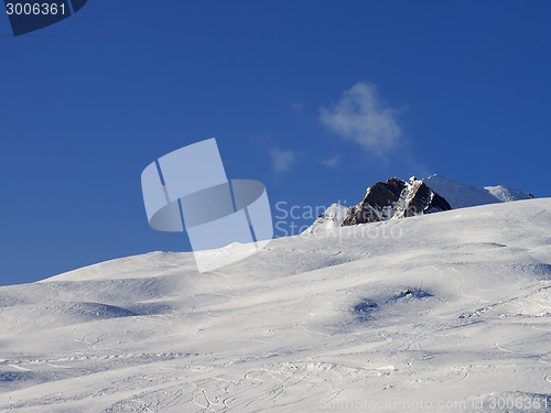 Image of Ski slope at sun evening