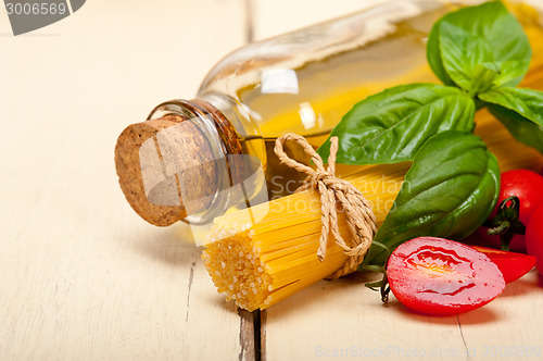 Image of Italian spaghetti pasta tomato and basil