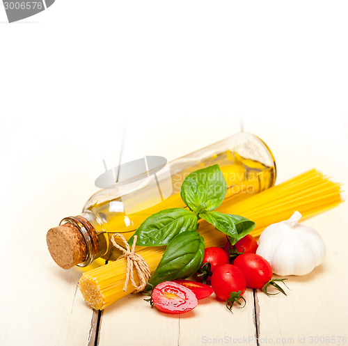 Image of Italian spaghetti pasta tomato and basil