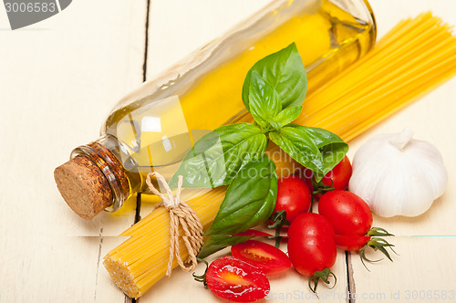 Image of Italian spaghetti pasta tomato and basil