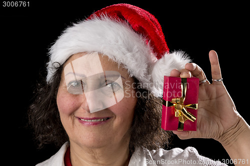 Image of Venerable Woman with Red Cap Holding Small Gift