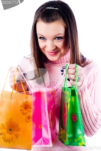 Image of Young beautiful woman with bag