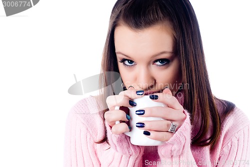 Image of Young attractive woman with cup