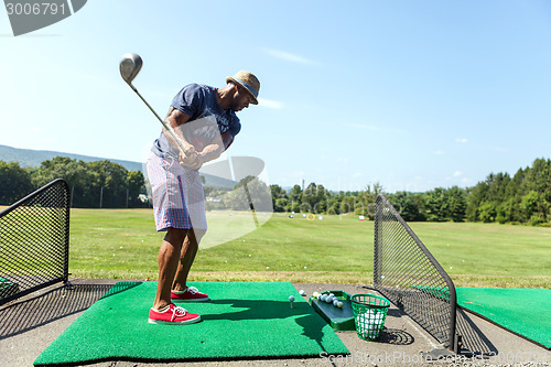 Image of Golfer at the Range