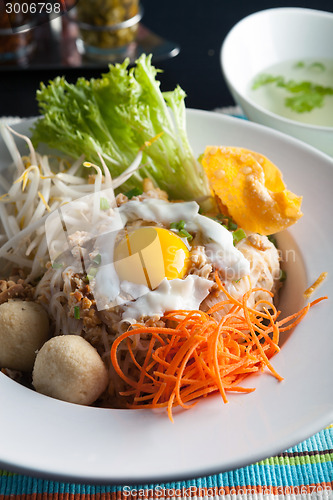 Image of Thai Noodle Dish with Fried Egg