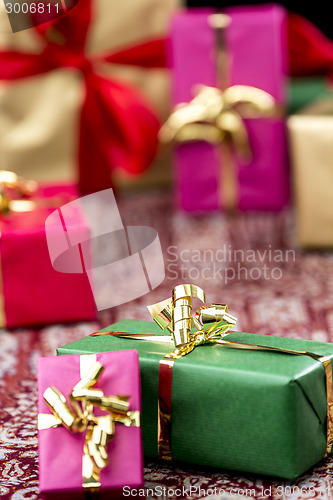 Image of Golden Bow Around Green Gift