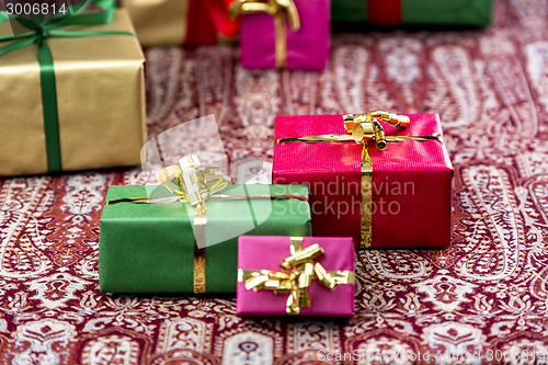 Image of Three Presents Standing Out