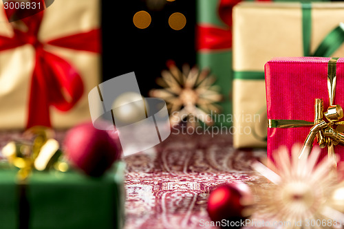 Image of Christmas Gifts Placed on a Festive Cloth