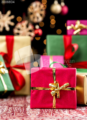 Image of Christmas Background with Gifts and Glitters