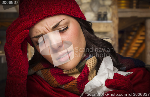 Image of Sick Woman Inside Cabin With Tissue