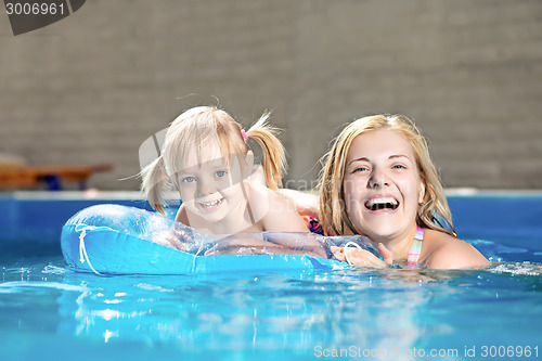 Image of Attractive little girl and her mother