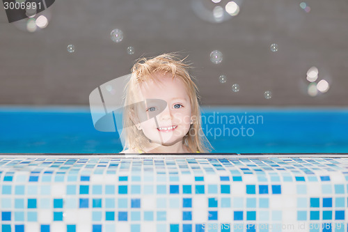 Image of Happy little blond girl