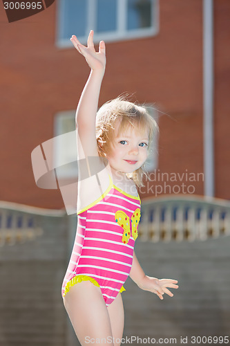 Image of Portrait of funny little blond girl