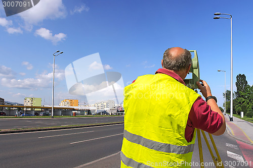 Image of Surveyor measuring