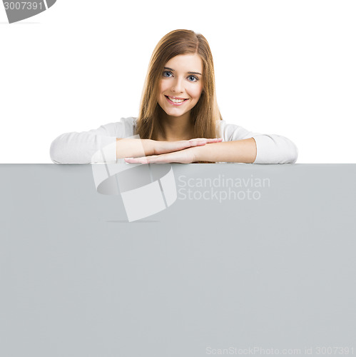 Image of Woman with a big blank board