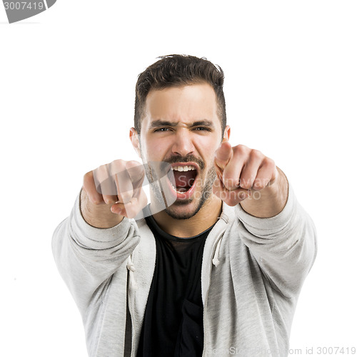 Image of Successful latin man pointing