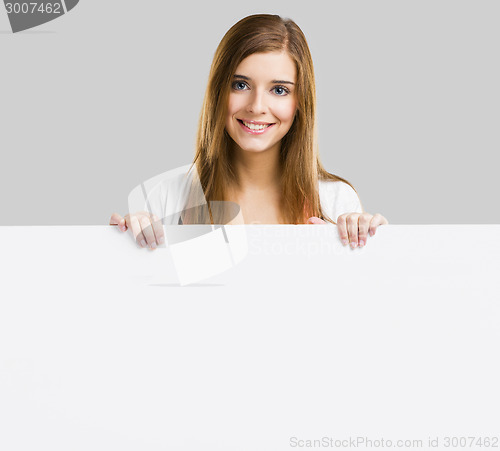 Image of Woman with a big blank board