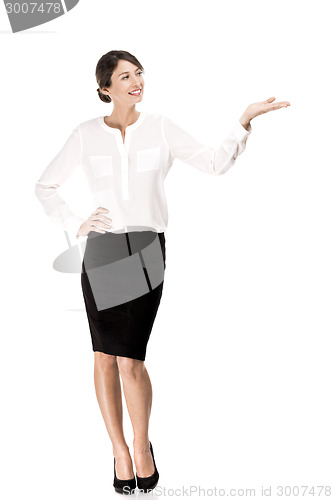 Image of Business woman showing something