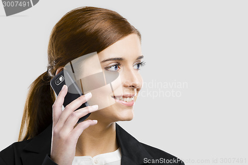 Image of Business woman making phone call
