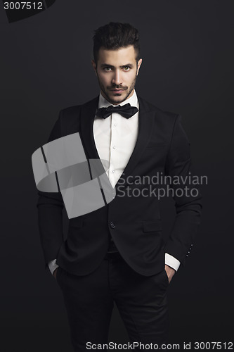 Image of Latin man wearing a tuxedo