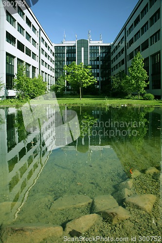 Image of Building office with water reflection