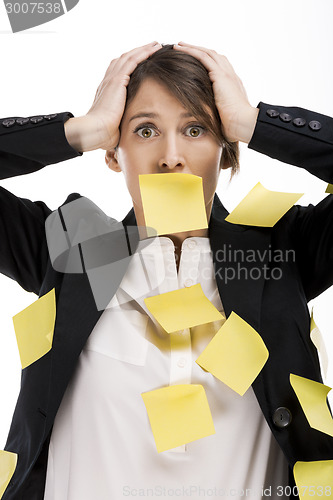 Image of Woman with yellow paper notes