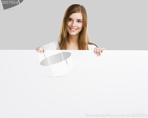 Image of Woman with a big blank board