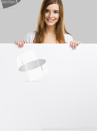 Image of Woman with a big blank board