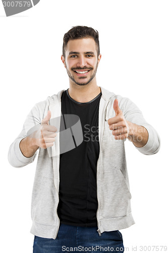 Image of Man smiling with thumbs up